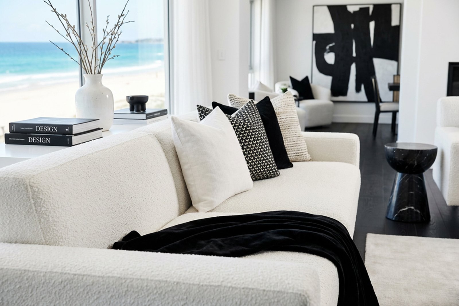 Bright contemporary living room with black and white art